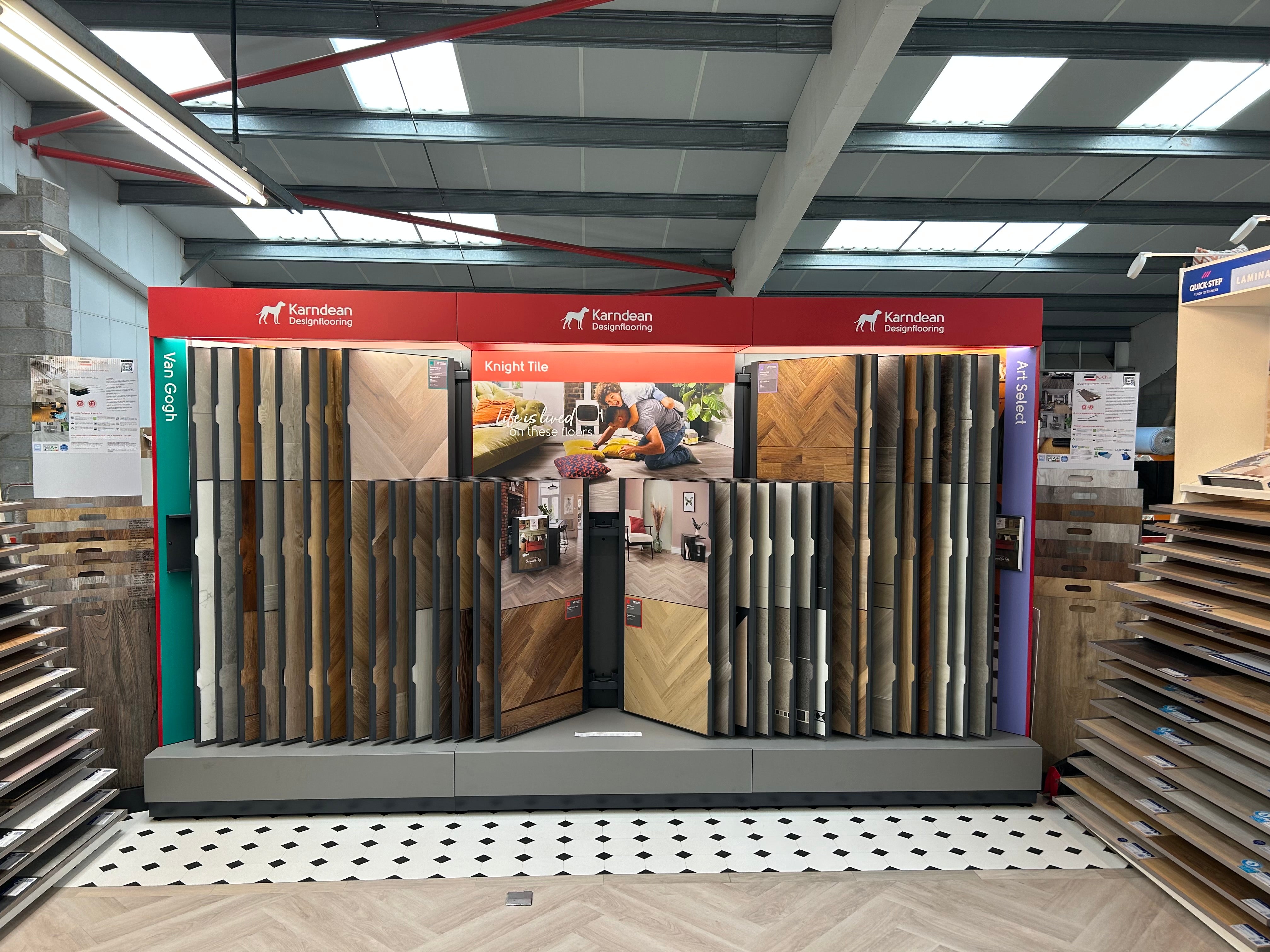 Display of Karndean samples in a showroom with Karndean branding.